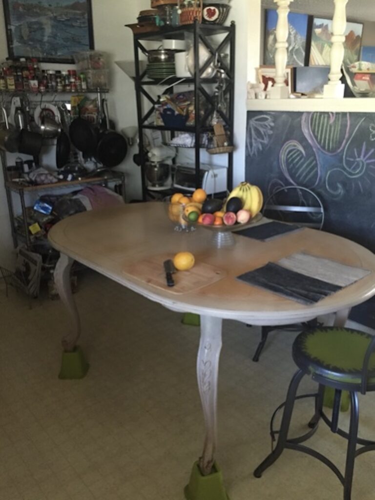 Showing the Etechier Shelf behind the DIY Kitchen Island